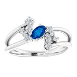 Oval Blue Sapphire Accented Ring with Diamond Accents in Platinum