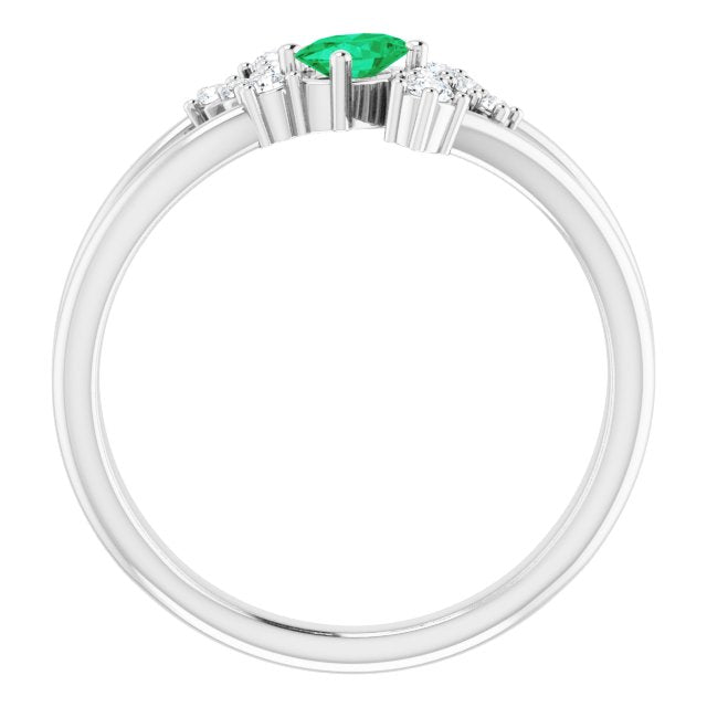 Oval Emerald Accented Ring with Diamond Accents in Platinum