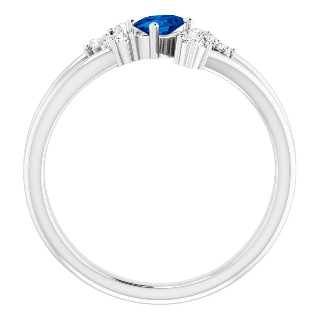 Oval Blue Sapphire Accented Ring with Diamond Accents in Platinum