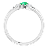 Oval Emerald Accented Ring with Diamond Accents in White Gold