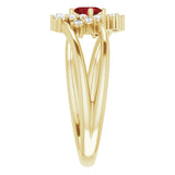 Oval Mozambique Garnet & Diamond Accented Ring in Yellow Gold