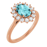 Oval Blue Zircon & Diamond Halo Ring in Gold and Platinum