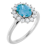 Oval Swiss Blue Topaz Halo Ring with Diamond Accents in Gold