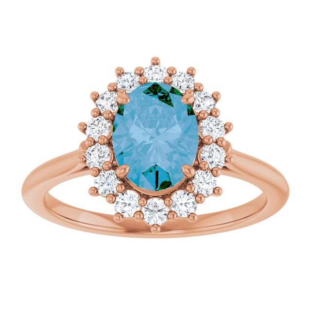 Oval Swiss Blue Topaz & Diamond Halo Ring in Gold and Platinum