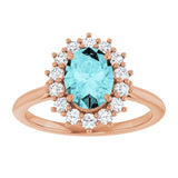 Oval Blue Zircon & Diamond Halo Ring in Gold and Platinum