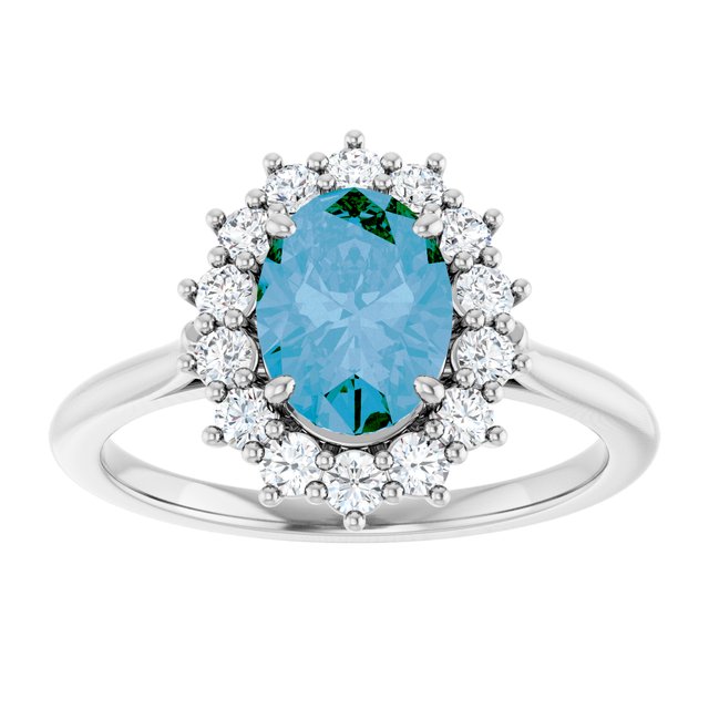 Oval Swiss Blue Topaz Halo Ring with Diamond Accents in Gold