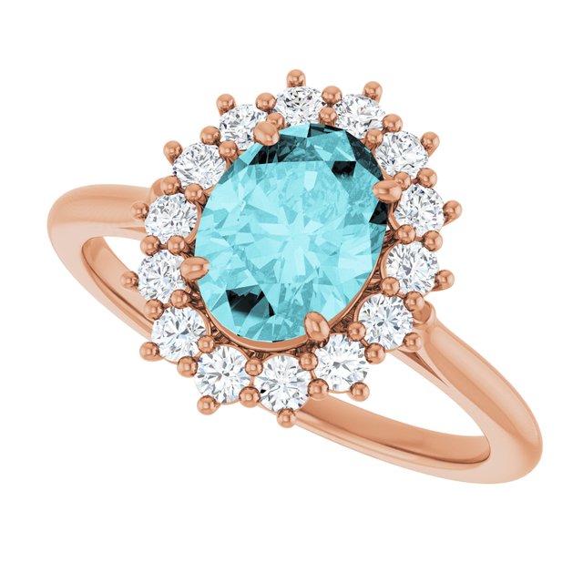 Oval Blue Zircon & Diamond Halo Ring in Gold and Platinum
