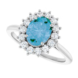 Oval Swiss Blue Topaz Halo Ring with Diamond Accents in Gold