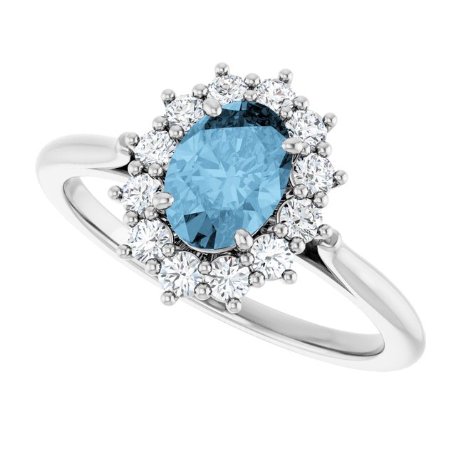 Oval Sky Blue Topaz & Diamond Halo Ring in Gold and Platinum