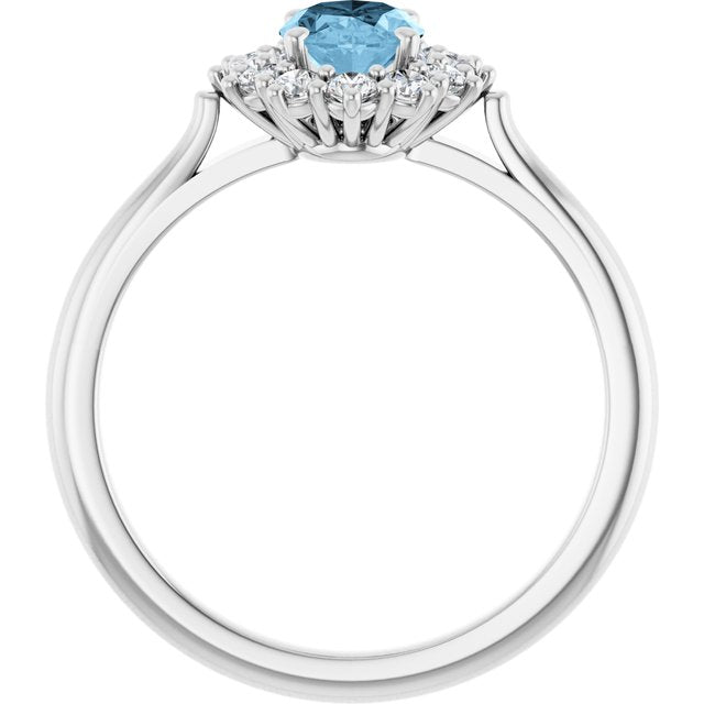 Oval Sky Blue Topaz & Diamond Halo Ring in Gold and Platinum
