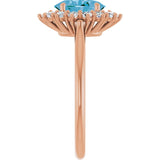 Oval Swiss Blue Topaz & Diamond Halo Ring in Gold and Platinum