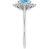 Oval Sky Blue Topaz & Diamond Halo Ring in Gold and Platinum