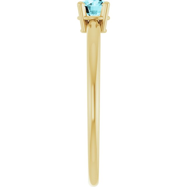 Round Blue Zircon Solitaire Ring in Yellow Gold
