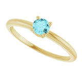 Round Blue Zircon Solitaire Ring in Yellow Gold