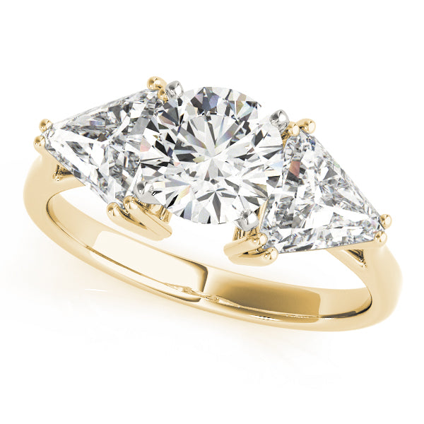 Gold ring with three diamond stones on a white background