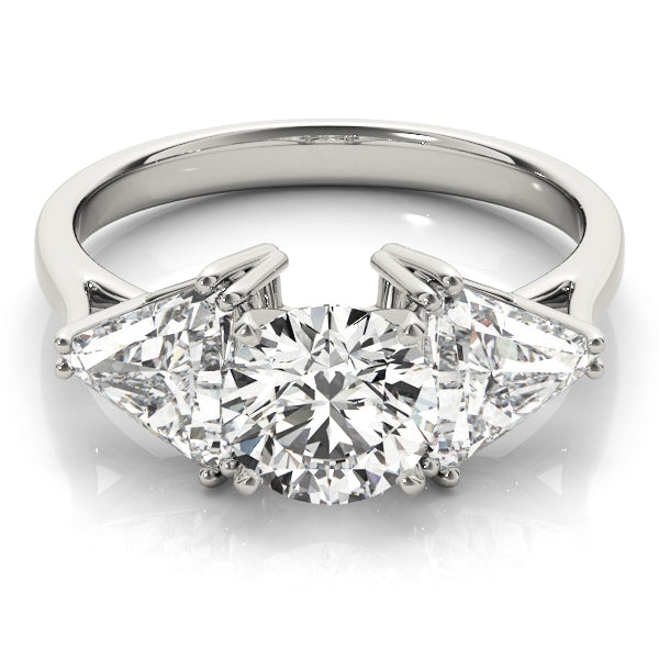 Diamond ring with two pear-shaped diamonds on a white background