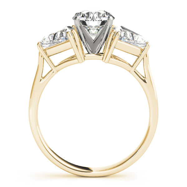 Gold ring with three diamonds on a white background