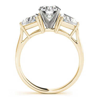 Gold ring with three diamonds on a white background