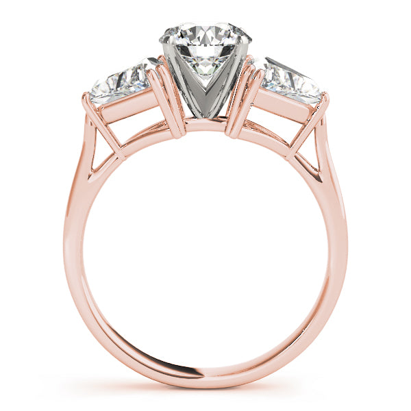 Rose gold ring with three diamond stones on a white background