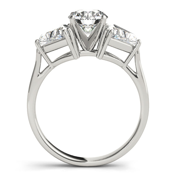 Diamond ring with three clear gemstones on a white background