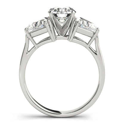 Diamond ring with three clear gemstones on a white background