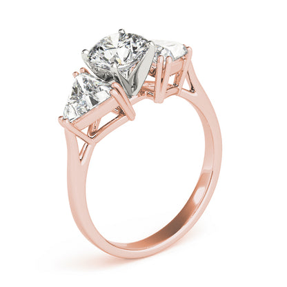 Rose gold ring with three diamond stones on a white background