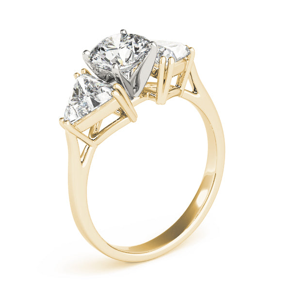 Gold ring with three diamonds on a white background