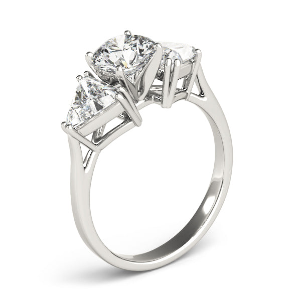 Diamond ring with three clear gemstones on a white background