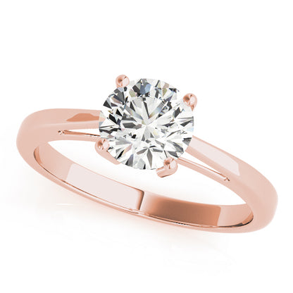 Round Cut Diamond Claw Setting Engagement Ring.