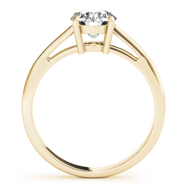 Round Cut Diamond Claw Setting Engagement Ring.