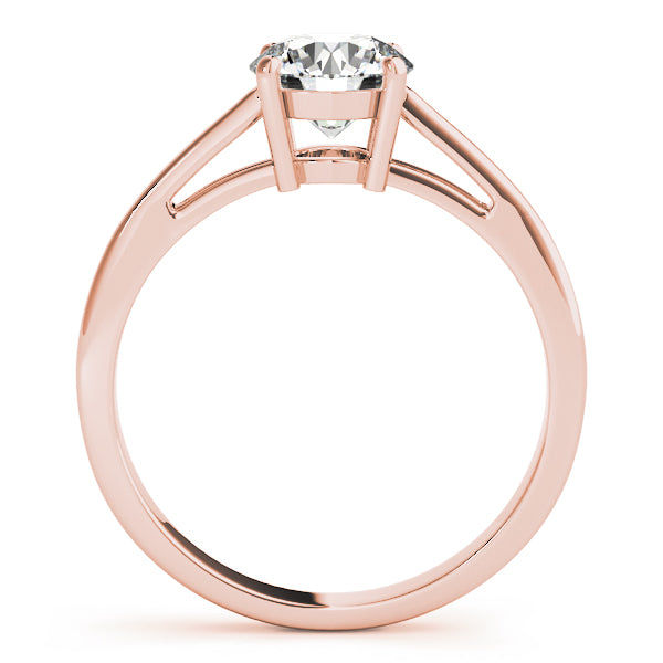 Round Cut Diamond Claw Setting Engagement Ring.