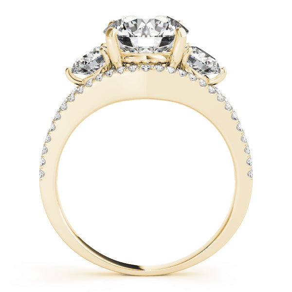 Gold ring with a large central diamond and smaller diamonds