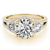 Gold ring with a large diamond and smaller diamonds 