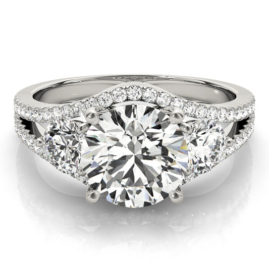 A diamond ring with a large central gemstone and smaller stones 