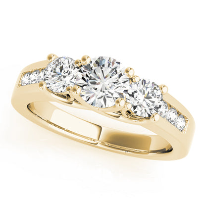 Gold ring with three diamonds