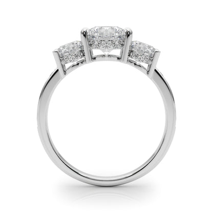 A diamond ring with three visible stones 