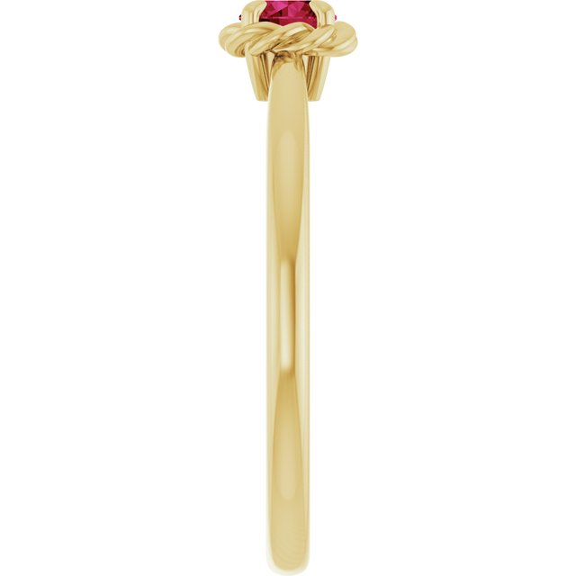 Round Ruby Solitaire Ring in Gold and Platinum