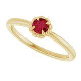 Round Ruby Solitaire Ring in Gold and Platinum