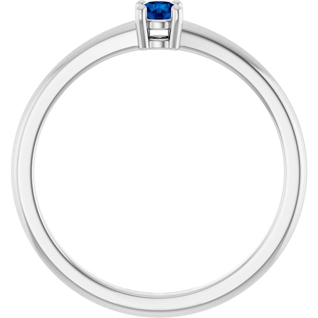 Round Blue Sapphire Solitaire Ring in Gold and Platinum