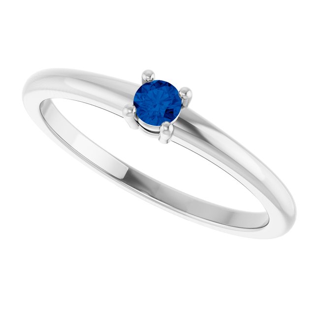 Round Blue Sapphire Solitaire Ring in Gold and Platinum
