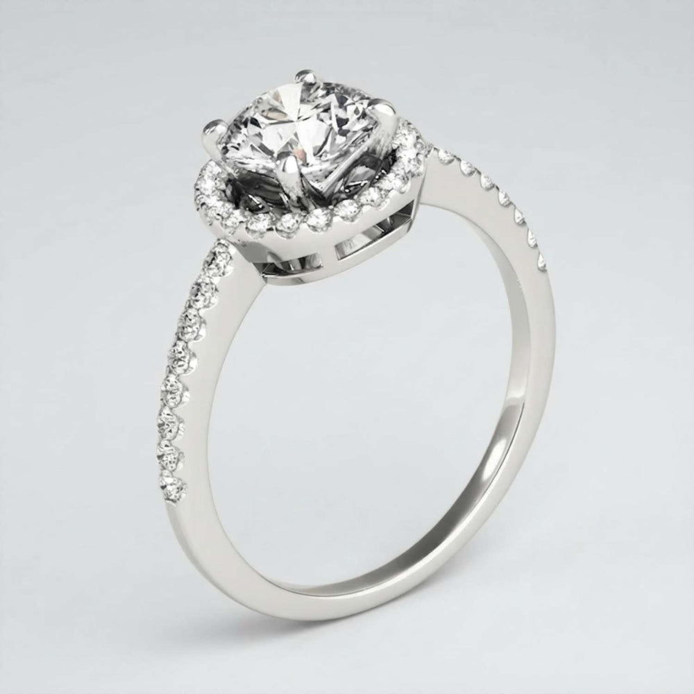Classic 9K yellow gold round diamond engagement ring highlighting traditional UK craftsmanship.