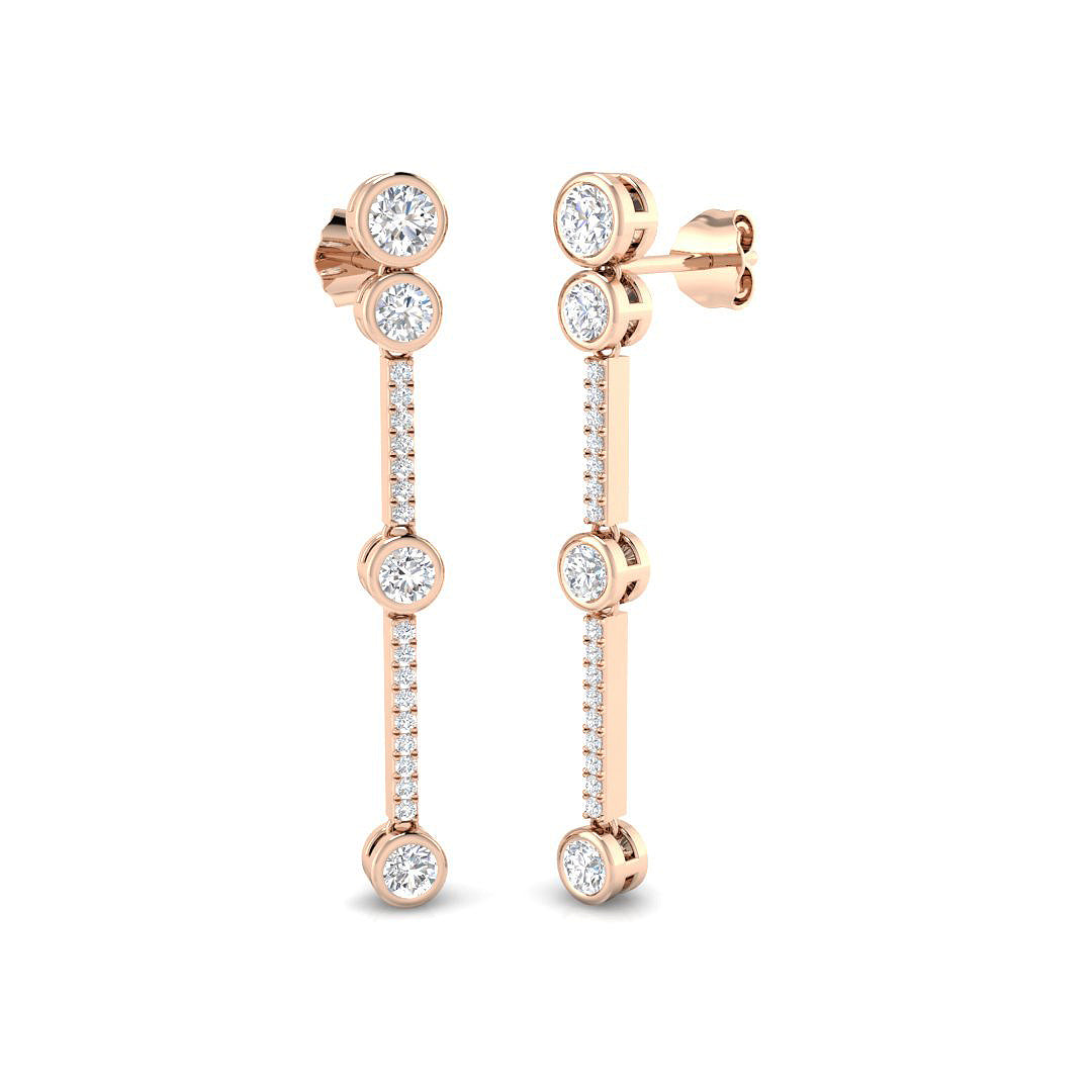 Elegant Gold Drop & Trilogy Diamond Earrings | Daggy Collection