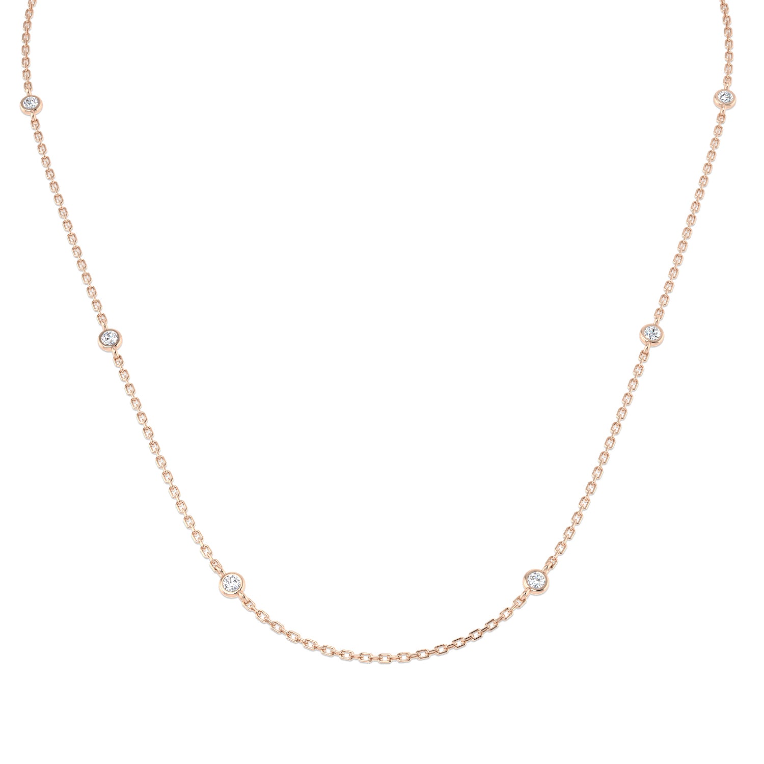 Rose gold necklace with small diamonds on a white background