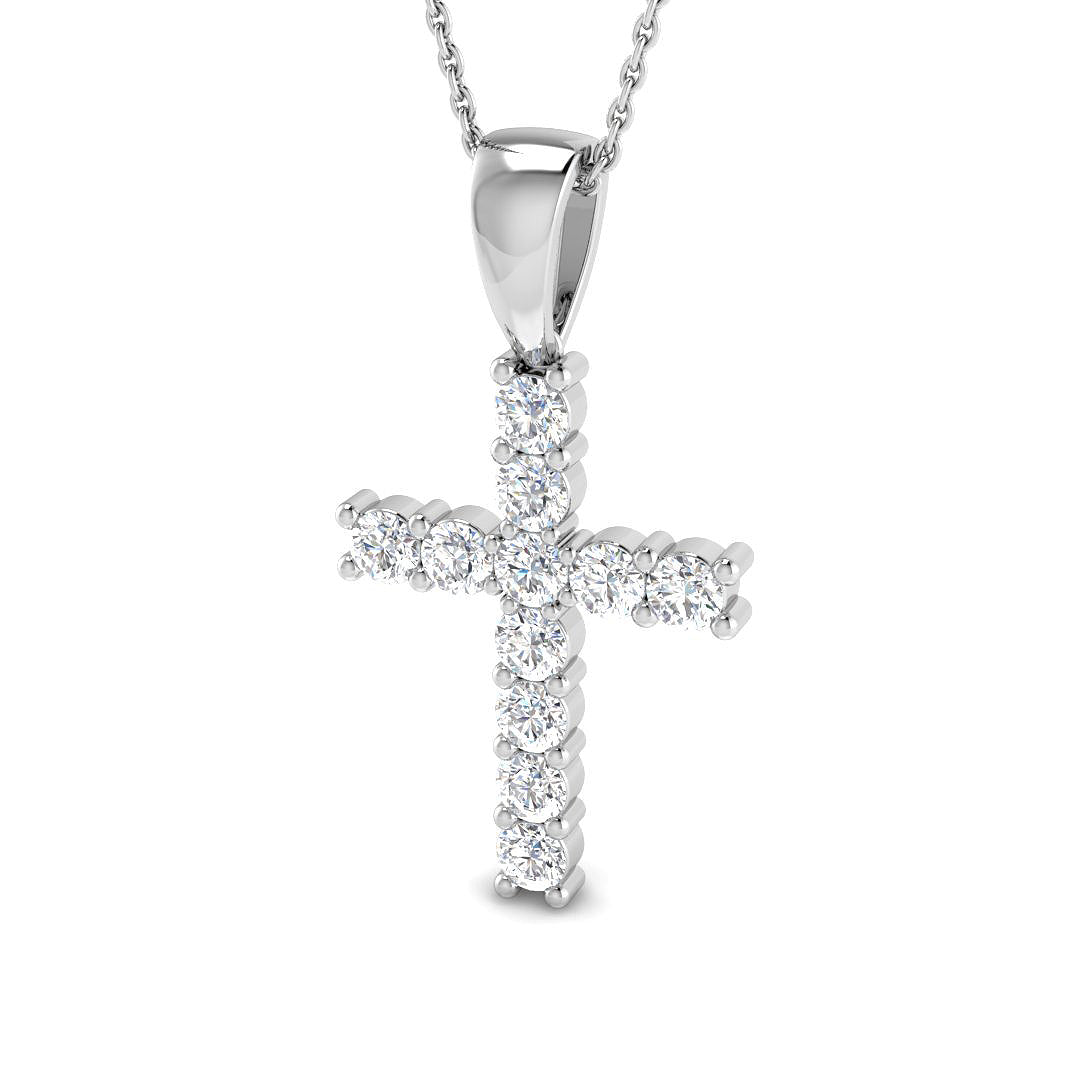 Silver cross pendant necklace on a white background