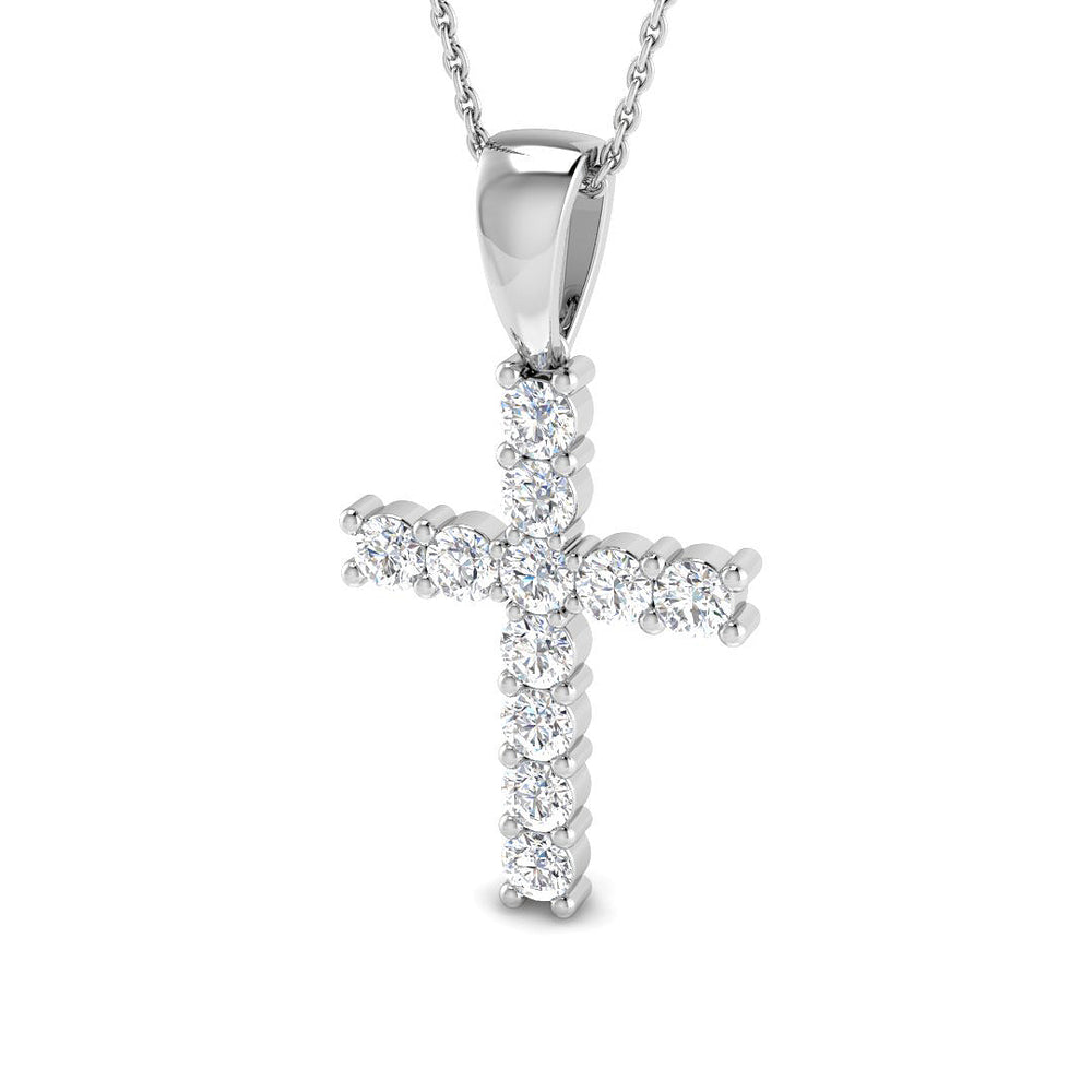 Silver cross pendant necklace on a white background