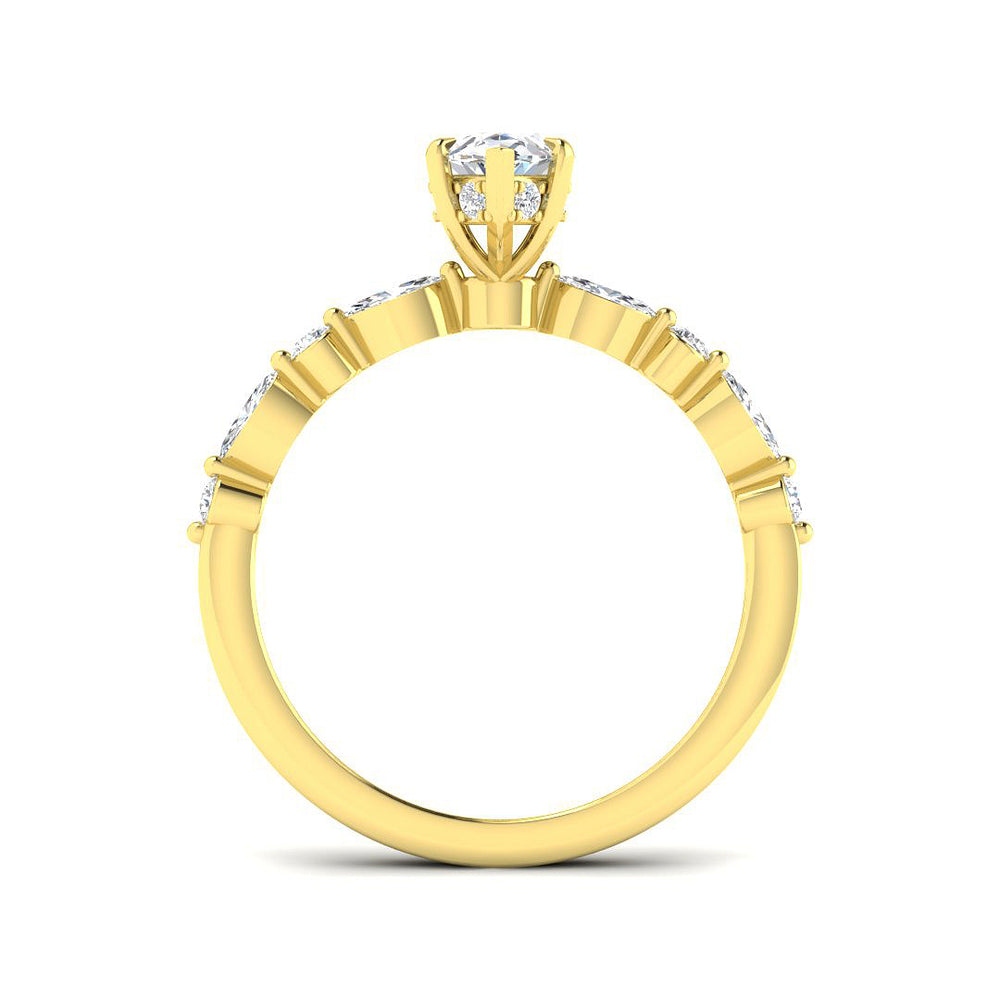 Elegant marquise cut diamond engagement ring in yellow gold with elongated centre stone and side diamonds