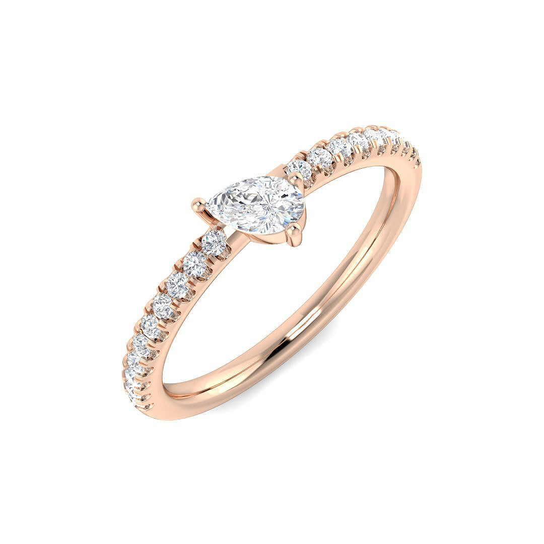 Rose gold pear shape diamond engagement ring with side diamonds