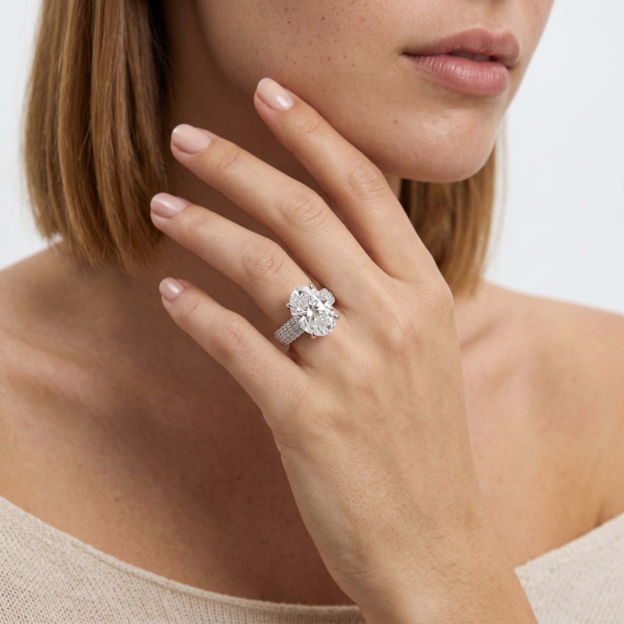 Oval Cut Diamond Engagement Ring with Double Pavé Band in Gold