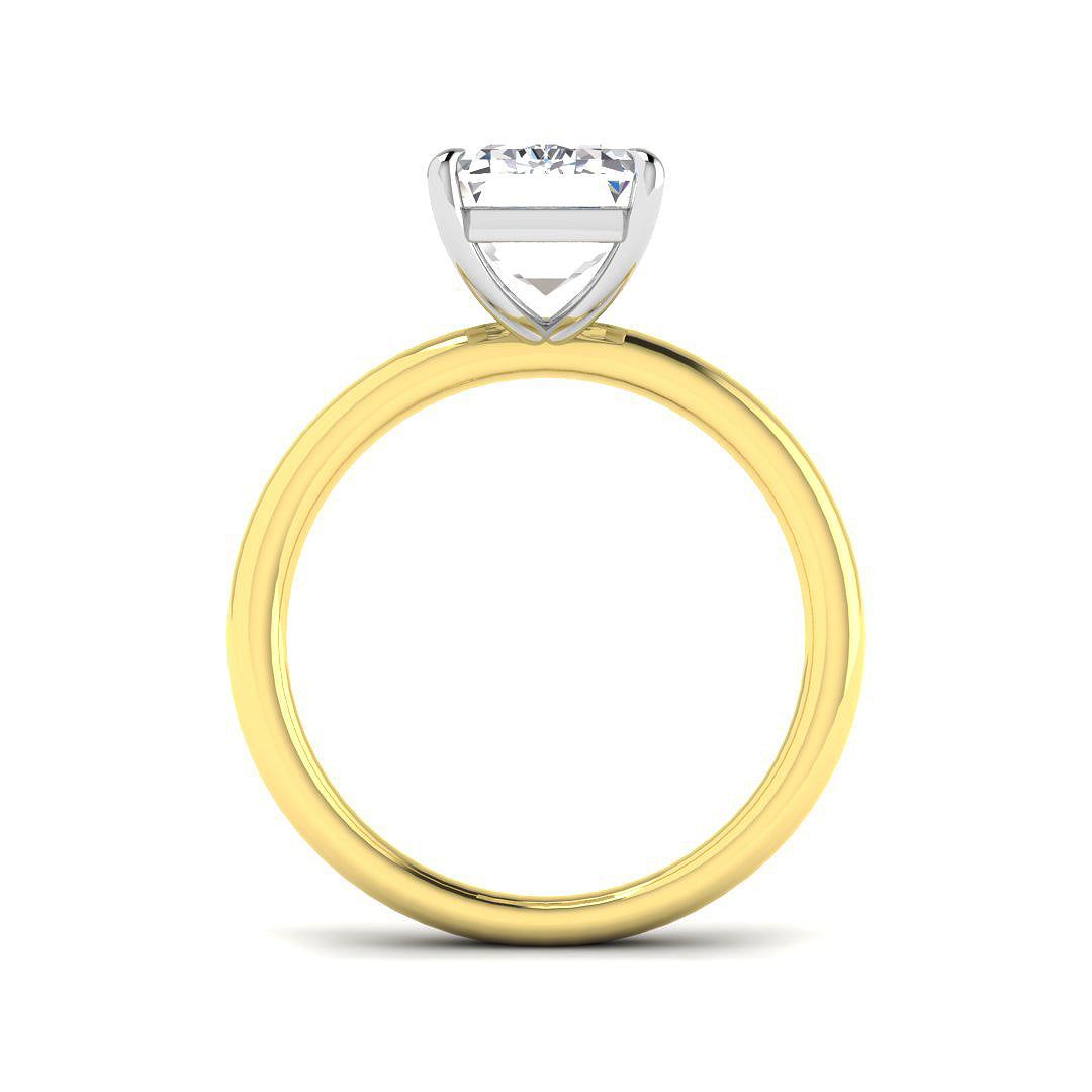 Gold ring with a diamond on a white background