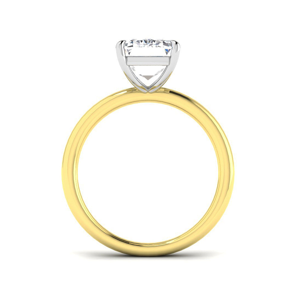 Gold ring with a diamond on a white background